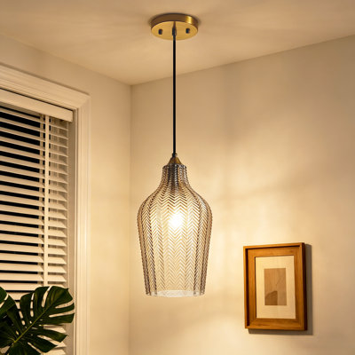 Luminaire suspendu moderne 1 lumière en or noir avec abat-jour en verre ambre Mercer41