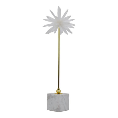 Crystal-Inspired Decorative Object With Geometric Base And Metallic Accents