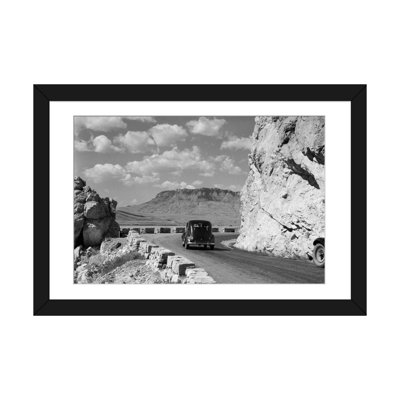 " 1930s-1940s Car Driving On Mountain Road In Yellowstone National Park Near Cody Wyoming USA " by Vintage Images