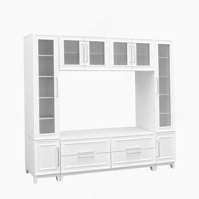 Meuble audio-vidéo moderne avec portes en verre, tiroirs et support pour téléviseur de 75 po ou moins.