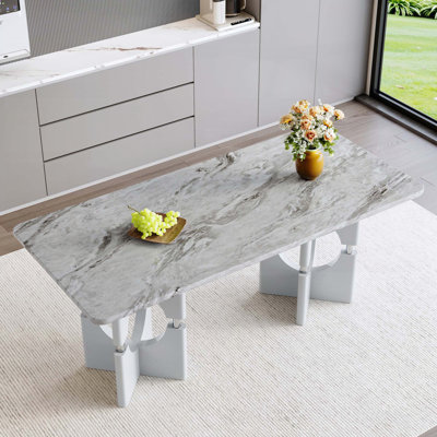 Table de salle à manger moderne en MDF à motif de marbre gris avec structure en métal creuse