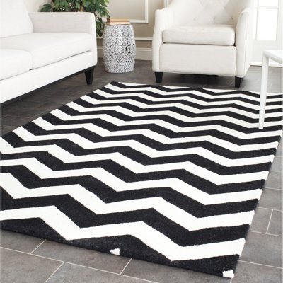 Tapis ivoire / noir en laine touffeté à la main Teresita