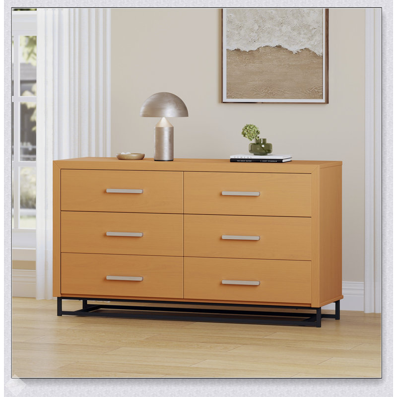 Commode à 6 tiroirs avec base en fer robuste et rangement spacieux, parfaite pour les espaces modernes et minimalistes.