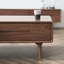 Table basse en noyer noir clair-107785366