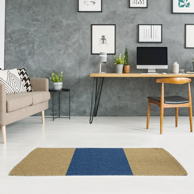 Tapis rayé doré / bleu marine