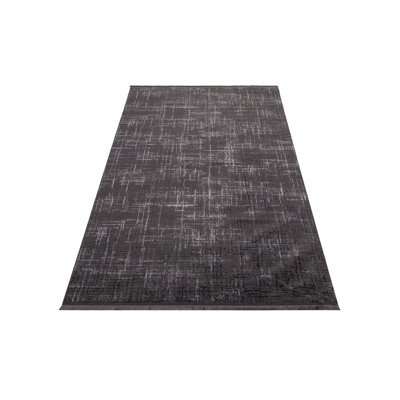 Tapis rectangulaire noir / ivoire tissé à la machine 6 pi 7 po x 9 pi 6 po