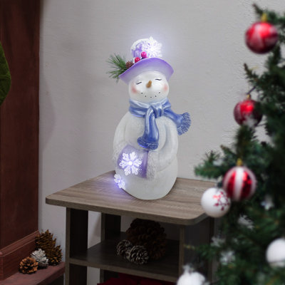 Bonhomme de neige d'hiver lavande avec manchon à main et scintillement DEL-SM