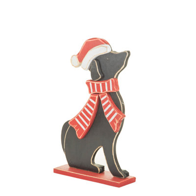 Chien debout noir assis