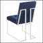 Chaise de salle à manger moderne à dossier capitonné avec pieds chromés pour une assise confortable et un rehaussement de salle à manger élégant