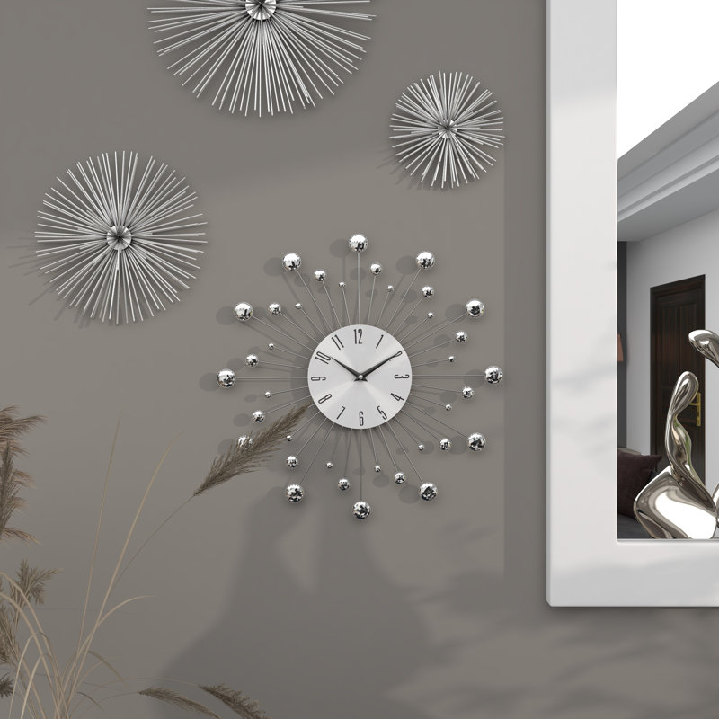 Metal Starburst Decorative Wall Clock with Crystal Accents, Silver
