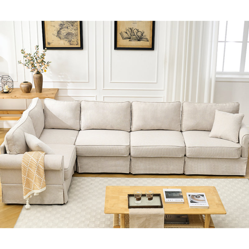Canapé modulaire à 5 places en L beige avec revêtement en tissu doux et base en lin beige, Polyester beige
