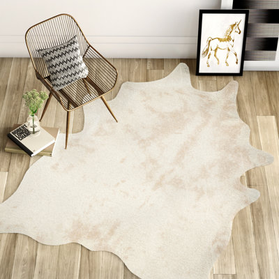 Isal Performance Hand Hooked Faux Cowhide Animal Print Indoor Rug