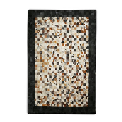 Brown Cowhide Patchwork Rug With Black Border
