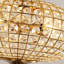 Lustre globe en cristal 5 lumières or antique