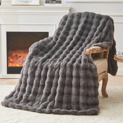 Couverture EMME en fausse fourrure