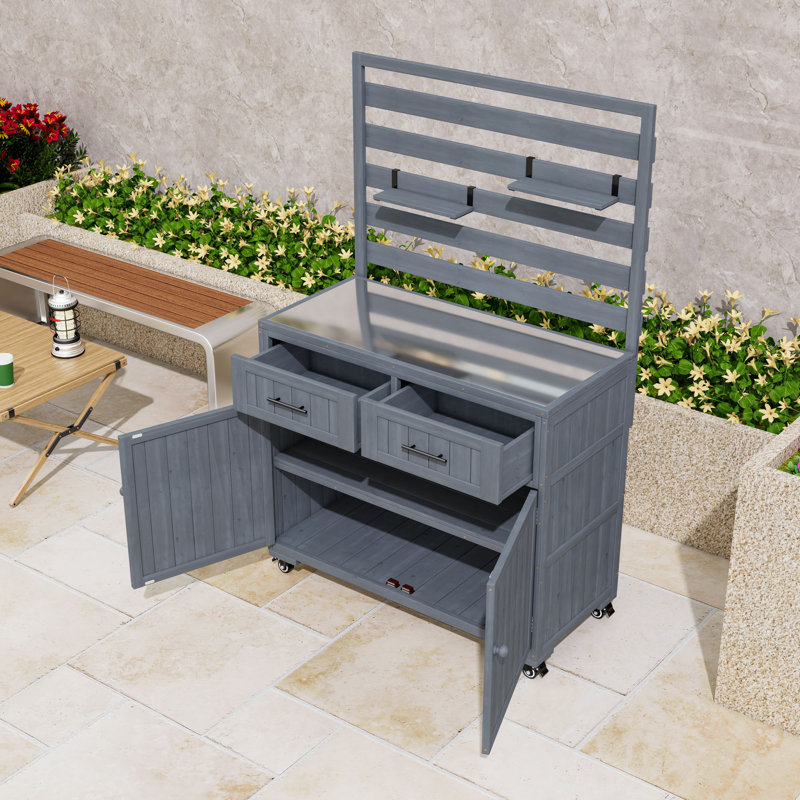 Îlot de cuisine en bois avec plateau, armoire et tiroirs en acier inoxydable
