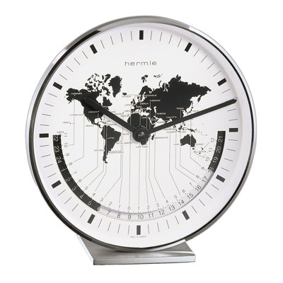Nickel Plated Table Clock with a Quartz Time Only Movement   Dial features a world map and different time zones.