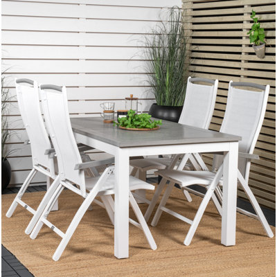 Jayesh 4 - Person Patio Dining Set with Extendable Rectangular Table