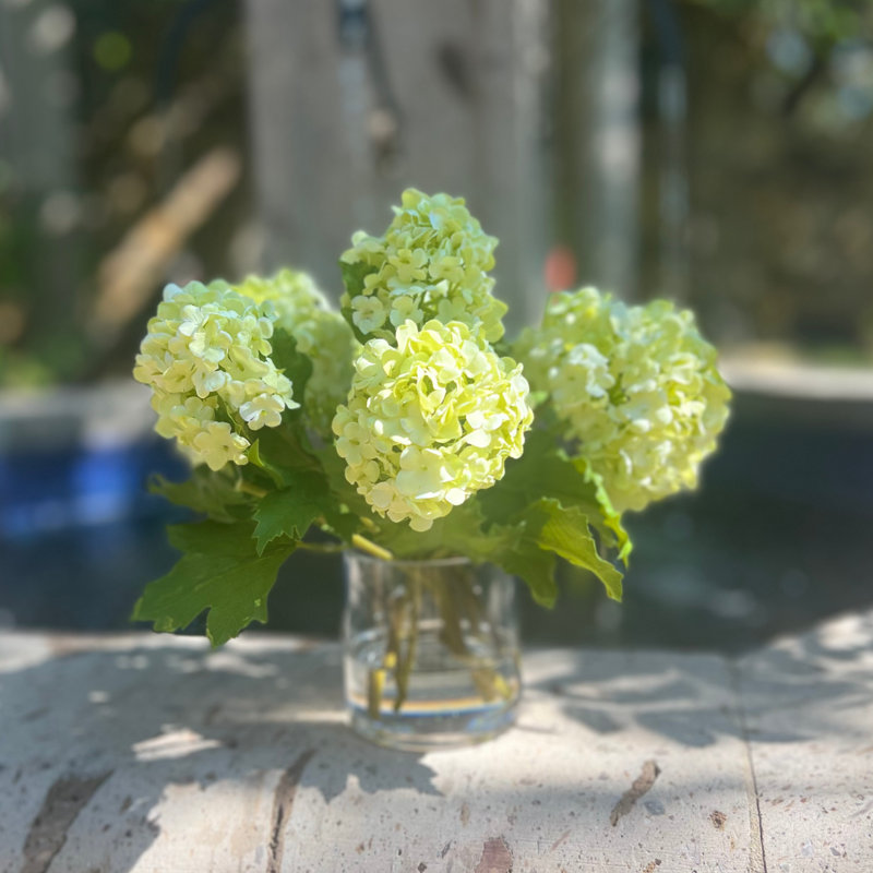 Silk hydrangeas arrangement in vase