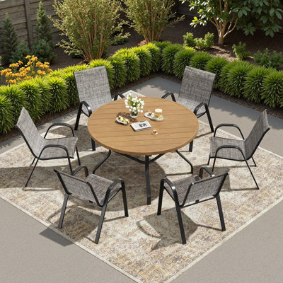 Ensemble repas pour 6 personnes avec table ronde de 47 po et 6 fauteuils empilables
