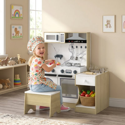 Cuisine miniature pour enfants, ensemble table et chaises convertibles 2 en 1 avec tabouret, cuisine d'imitation avec évier, four, micro-ondes et 5 accessoires de cuisine en acier inoxydable pour les enfants de 3 à 8 ans.