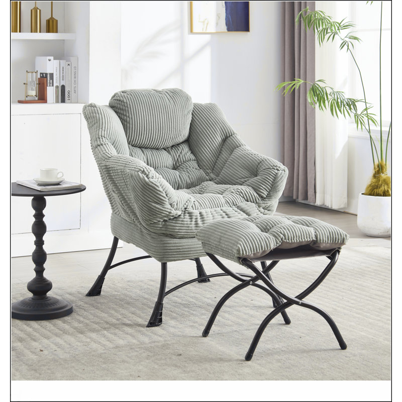 Méridienne moderne avec repose-pieds, accoudoirs et poche latérale pour une lecture confortable et une détente dans les petits espaces