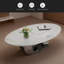 Table basse en marbre avec base sculpturale en acier inoxydable-118554355