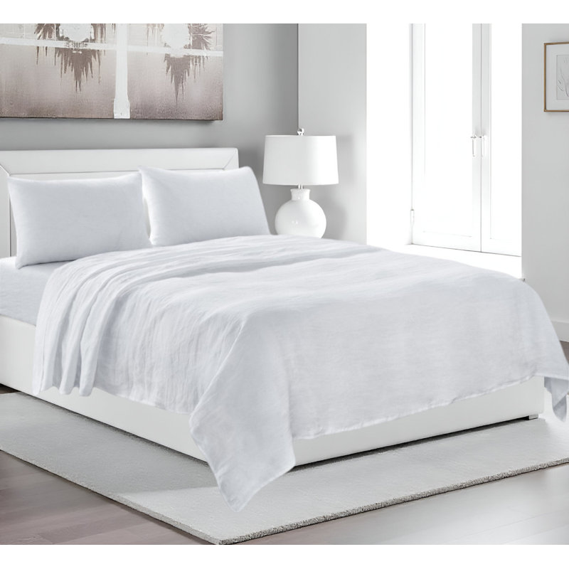 Ensemble de draps pour grand lit quatre pièces en lin blanc