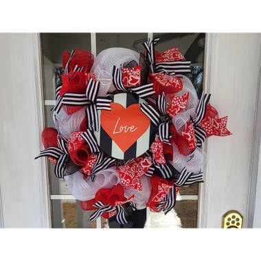 Love medley heart shape wreath 24 inch by Stanley Ito Florist