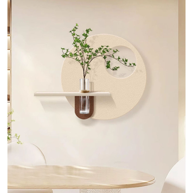 Sculpture murale circulaire ajourée avec vase pour un décor minimaliste de salle à manger., 27.56" H x 35.43" W x 4.72" D
