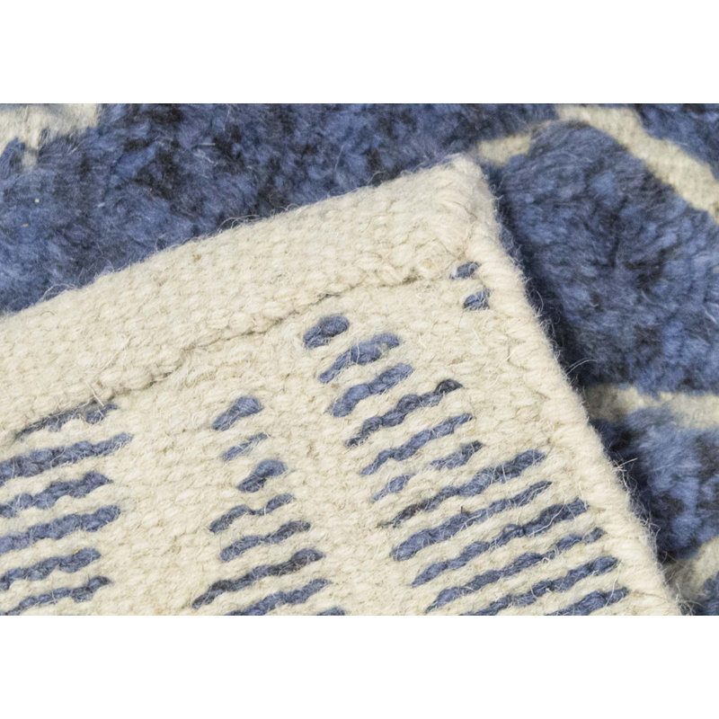 Tapis bleu et ivoire de haute qualité noué à la main