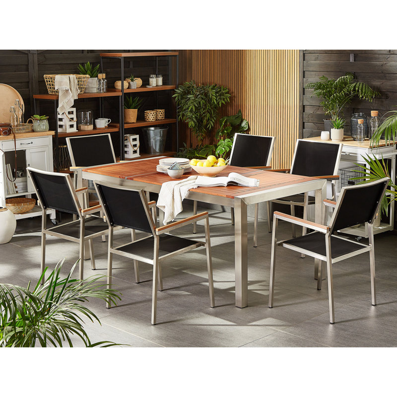 Lothen 6 - Person Teak Patio Dining Set with Rectangular Table , Cushions Included, Black