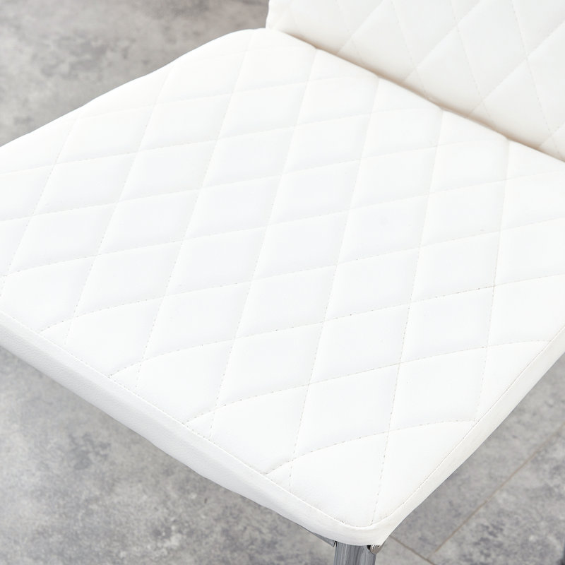 6 chaises de salle à manger blanches. Matériau en polyuréthane, pieds argentés. Coussin doux, ergonomique. Pieds coulissants. 20,4 po. Design minimaliste pour 6 maisons. Pieds en métal, matériau. Coussin en éponge respirant. Stable