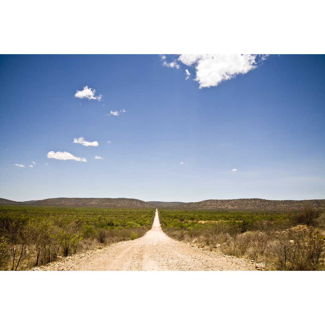 Endless Gravel Road To The Horizon von Mlenny - Kunstdrucke ohne Rahmen auf Leinwand