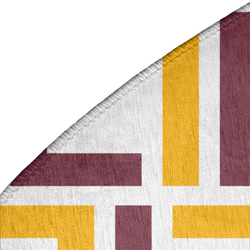 Tapis rond jaune / rouge à motif géométrique