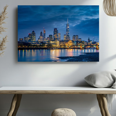 Canvas A Nighttime Cityscape Featuring A Striking Skyline Illuminated By A Wall Art Myriad Of Lights Reflecting Off The Water Below In Canvas Wall Art