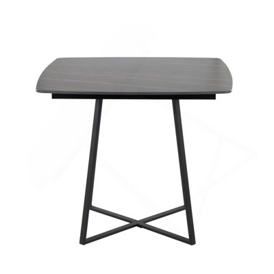 Table de salle à manger avec base en métal noir et bois noir avec plateau en céramique effet marbre noir