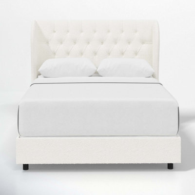 Tomey Upholstered Wingback Bed