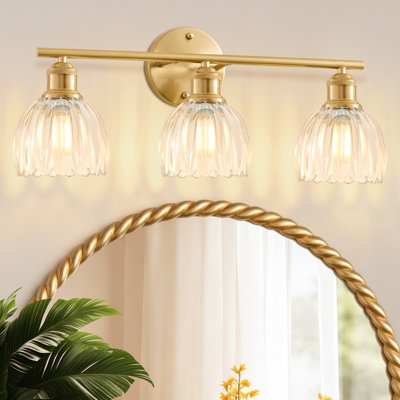 Applique murale à 3 lumières en or brossé, avec abat-jour en verre tulipe transparent, idéale pour la salle de bain, la chambre ou le salon.