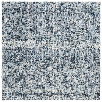 Gelissa Abstract Hand Tufted Wool/Cotton Abstract Rug in Ivory/Black