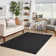 Mullican Sandy Solid Black Easy Care Indoor/Outdoor Area Rug