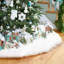Jupe de sapin de Noël en fausse fourrure Blanche-Neige, douce et luxueuse pour décorer votre intérieur pendant les fêtes.