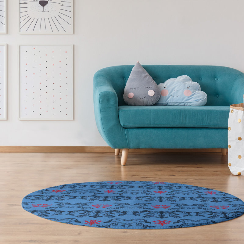Tapis rond bleu damassé à motif baroque