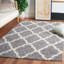 Tapis à poil long en tissu performance à motif géométrique Alonnah-964964764