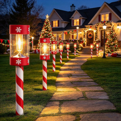 Paquet de 12 lumières d'extérieur en forme de canne de bonbon, conception de canne de bonbon festive avec des accents de flocon de neige, lueur chaude Edison, énergie solaire, installation facile pour la décoration de Noël des fêtes