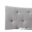 Grand lit en tissu gris avec rembourrage élégant et structure basse moderne