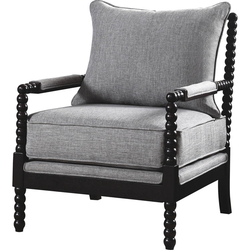 Chaise grise rembourrée avec un dossier noir pour un effet contrastant, une structure élancée et un revêtement élégant