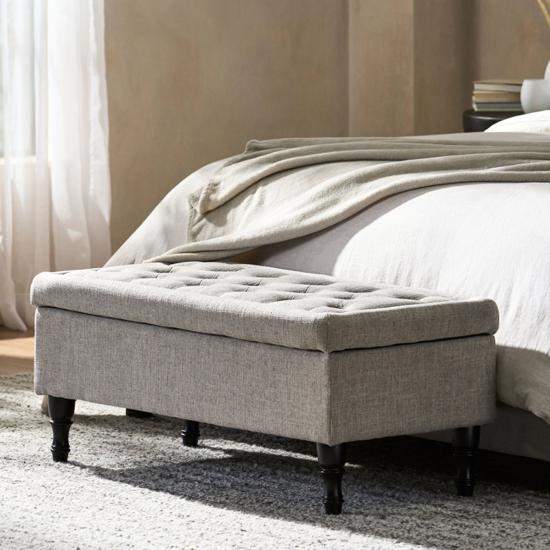 Housse gracieuse en tissu gris avec capitonnage et housse de rangement cachée