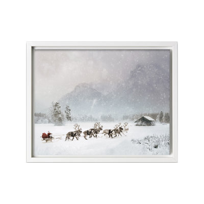 Père Noël traîneau à rennes