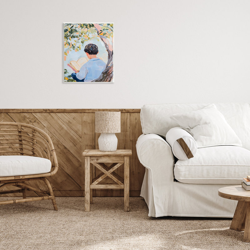 Garçon lisant dans la nature, plaque murale, design par The Prints Vibe